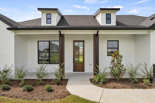 doorway to property featuring a porch