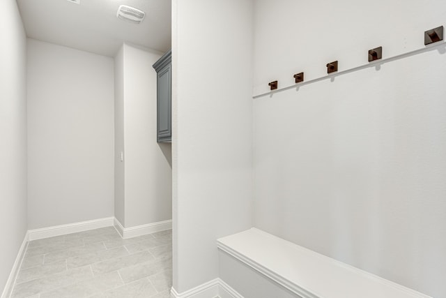 mudroom with light tile floors