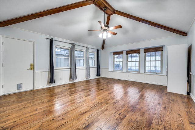 unfurnished living room with lofted ceiling with beams, dark hardwood / wood-style floors, and ceiling fan