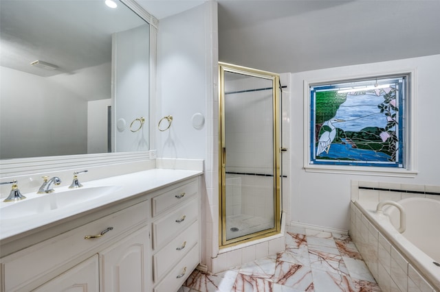 bathroom with shower with separate bathtub, vanity, and tile floors