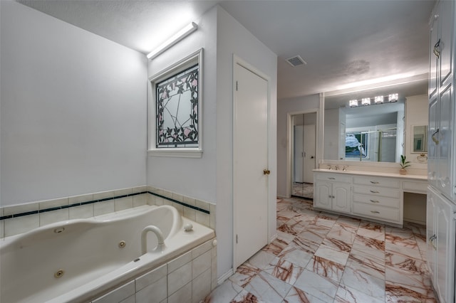 bathroom featuring tile flooring, a textured ceiling, and vanity