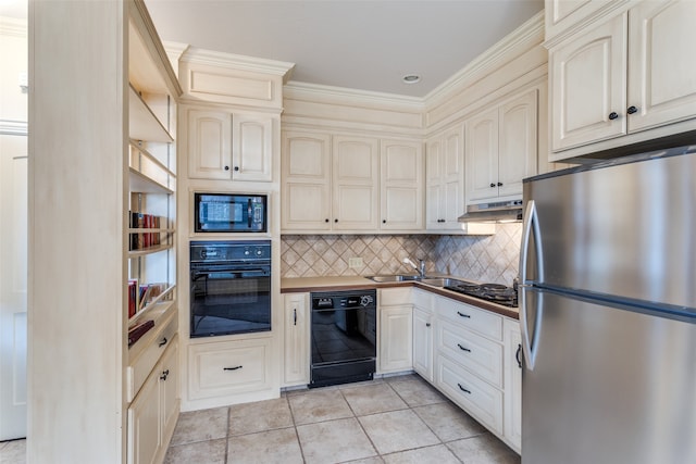 kitchen with decorative backsplash, ornamental molding, black appliances, cream cabinets, and light tile patterned floors