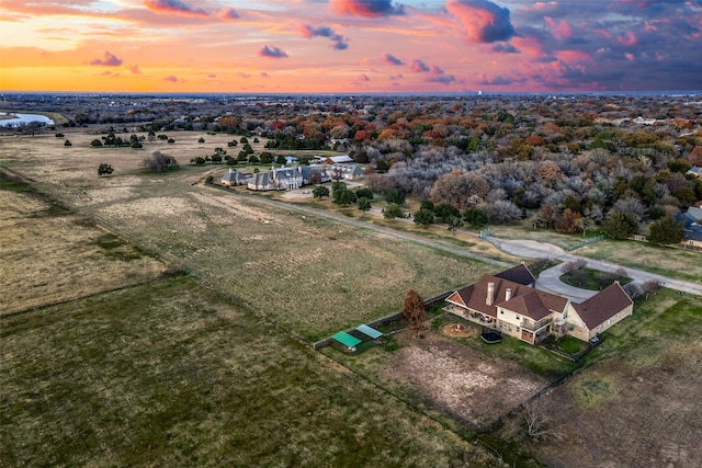 aerial view at dusk with a rural view