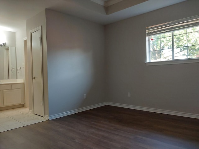 empty room with light hardwood / wood-style floors