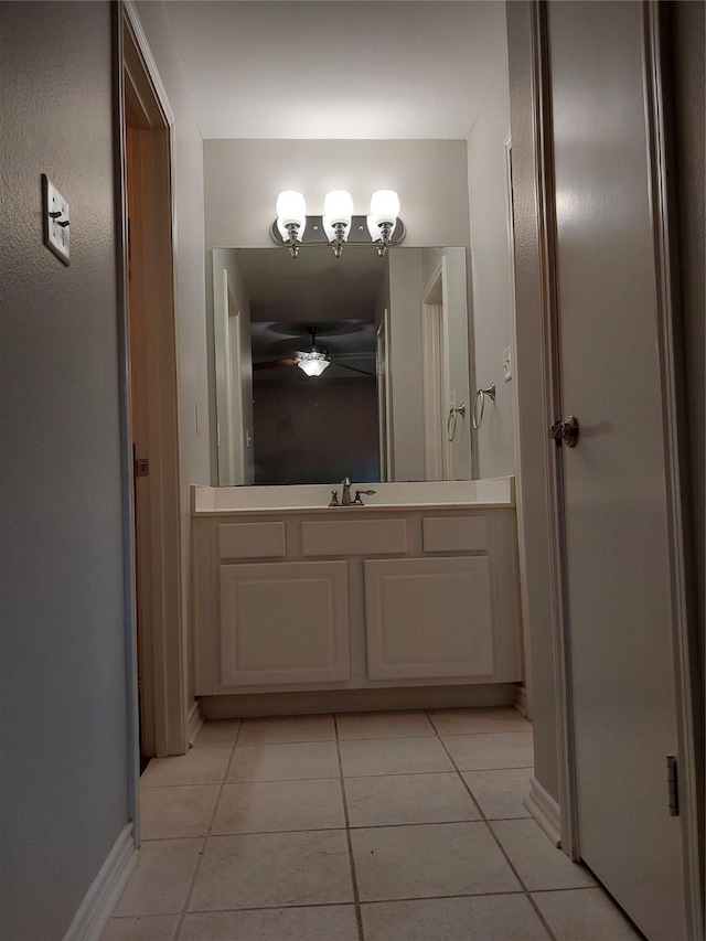 bathroom featuring tile patterned floors and vanity