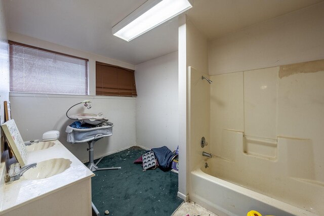 bathroom with vanity and tub / shower combination