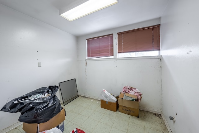 interior space with light tile patterned floors