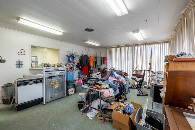 miscellaneous room featuring carpet