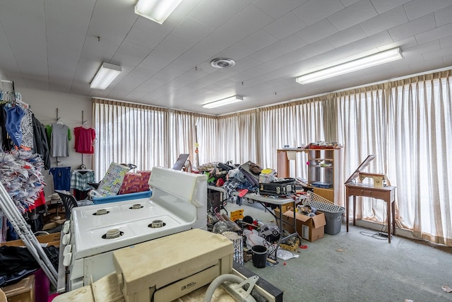 miscellaneous room with concrete flooring and visible vents