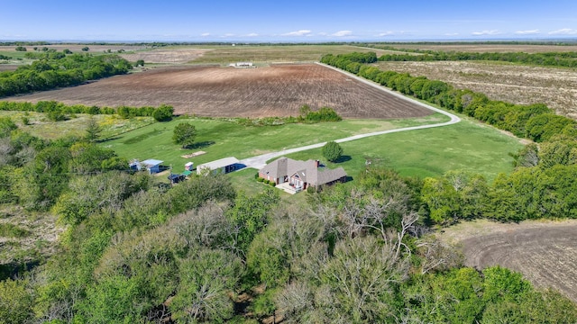 birds eye view of property featuring a rural view