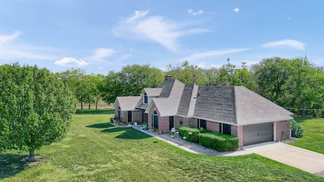 exterior space with a garage and a front yard