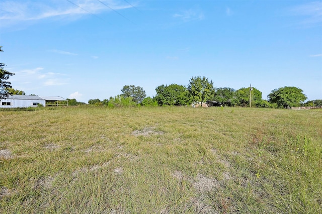 view of landscape with a rural view