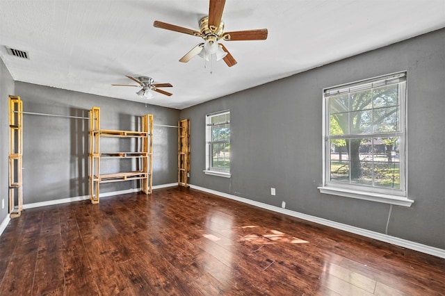 interior space featuring plenty of natural light, ceiling fan, and hardwood / wood-style flooring