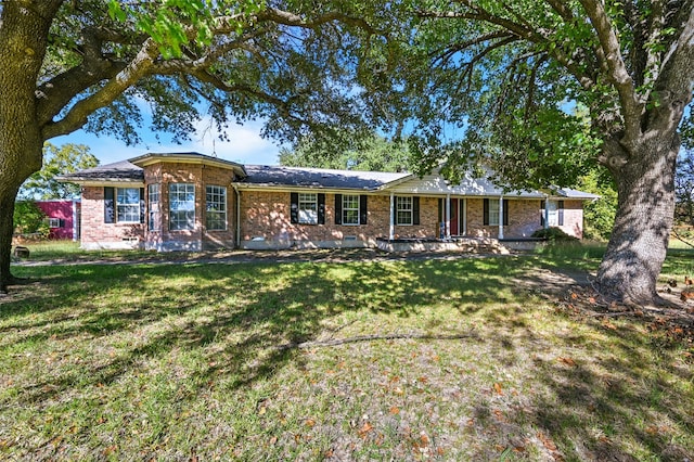 ranch-style home with a front yard