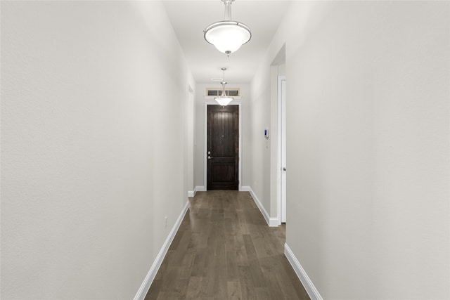 hallway featuring hardwood / wood-style floors