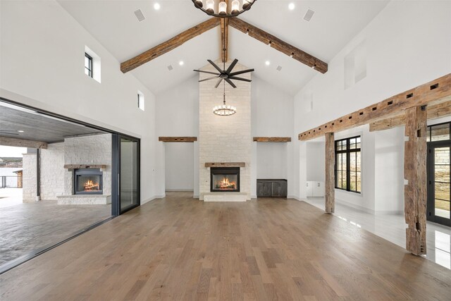 bathroom with lofted ceiling with beams, vanity, and an inviting chandelier