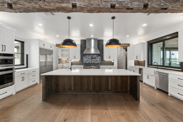 details featuring concrete flooring, light brown cabinetry, and tasteful backsplash