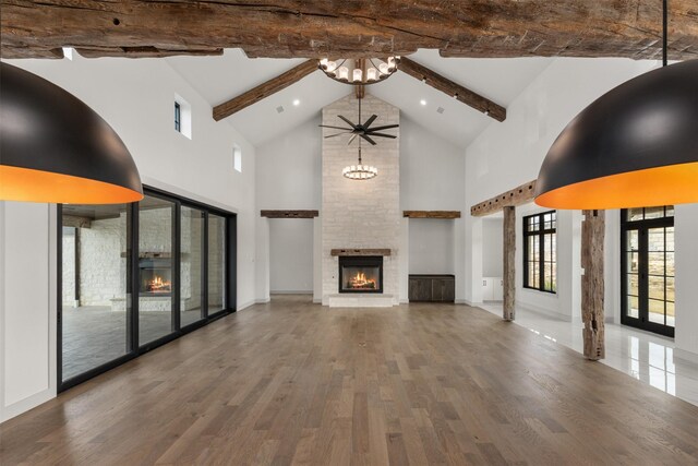 hallway featuring wood walls and beamed ceiling