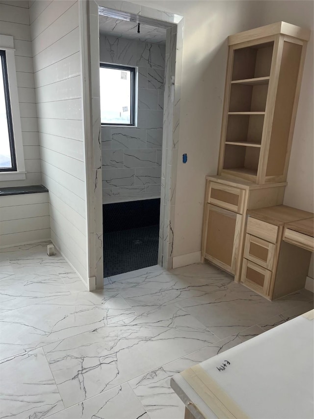 bathroom featuring plus walk in shower