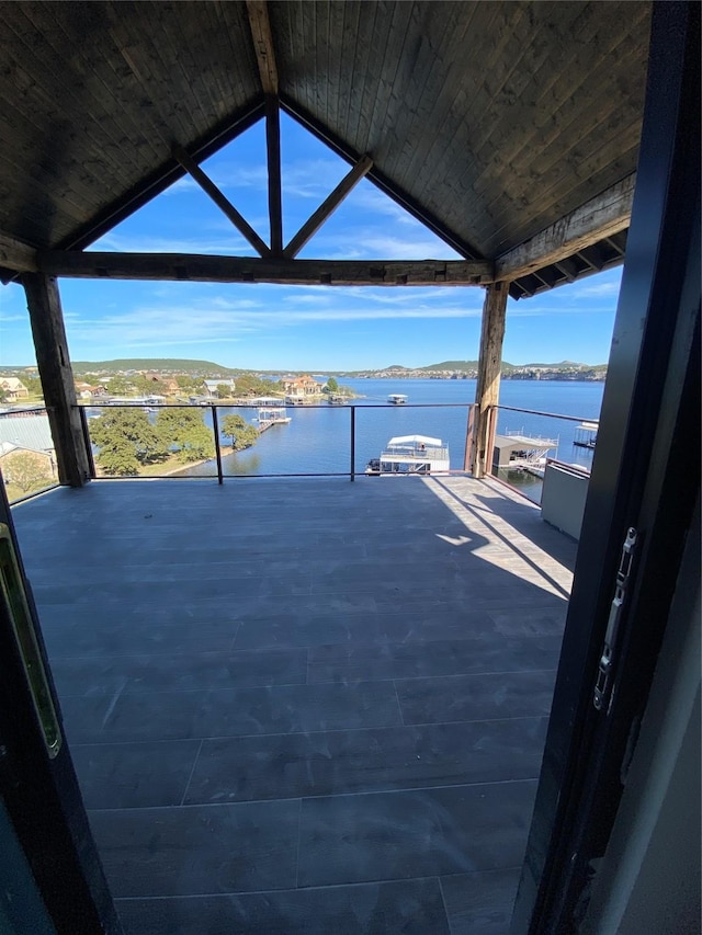 view of patio featuring a water view