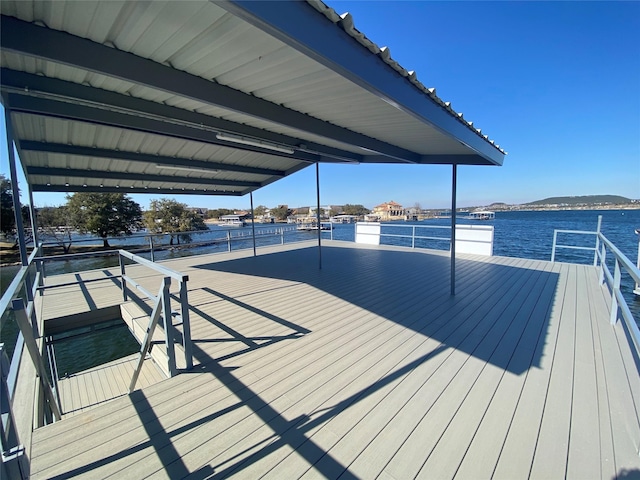 dock area with a water view