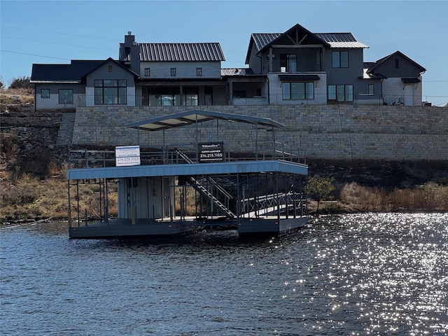 exterior space with a water view