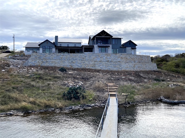 exterior space featuring a water view