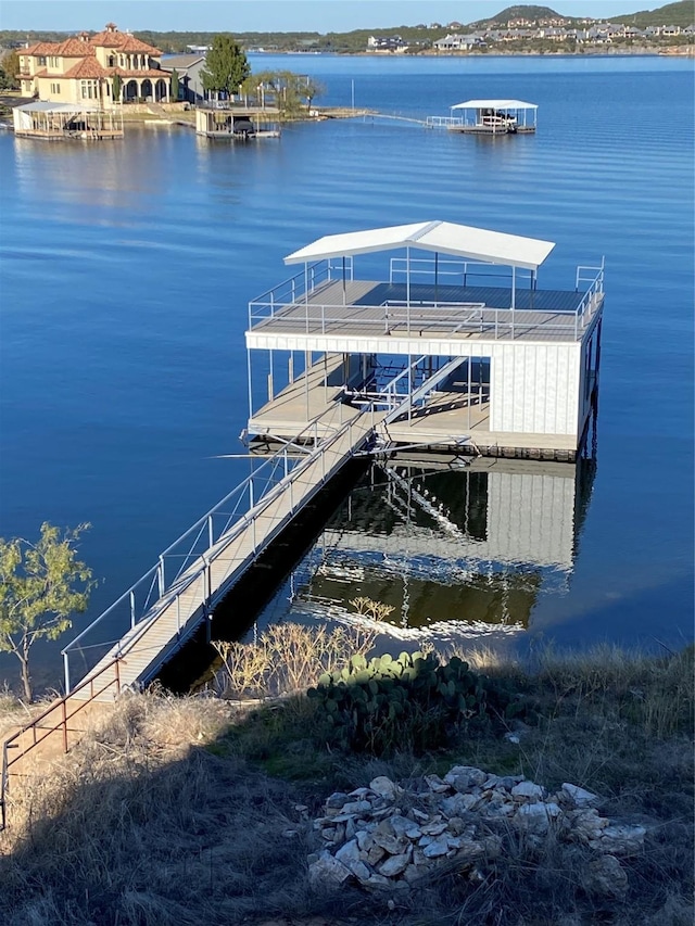 dock area featuring a water view