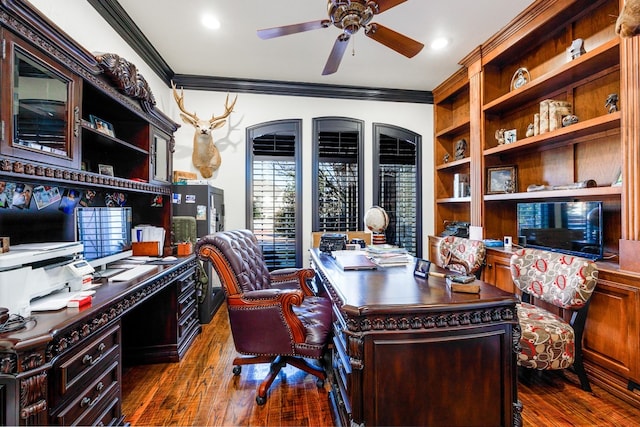 home office featuring ceiling fan, dark hardwood / wood-style floors, and crown molding