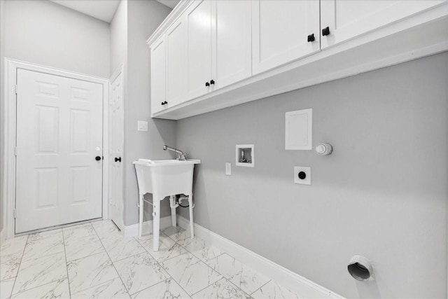 laundry room featuring washer hookup, cabinets, and hookup for an electric dryer