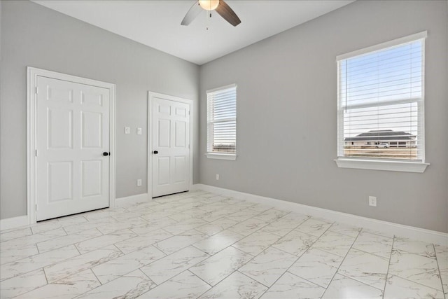 unfurnished bedroom with ceiling fan