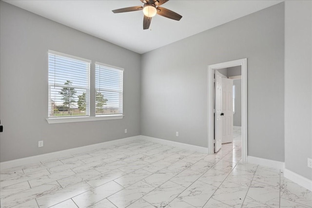 empty room featuring ceiling fan