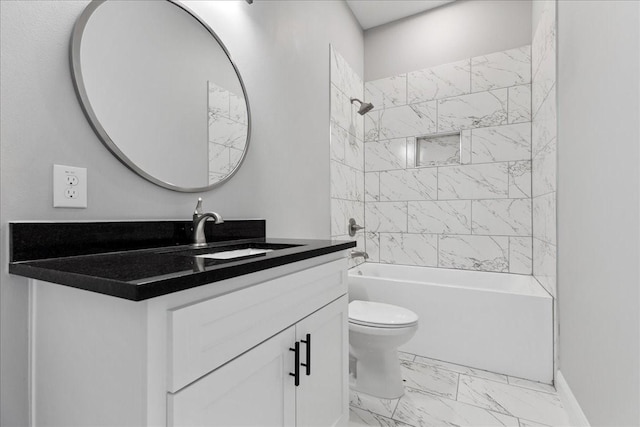 full bathroom with toilet, tiled shower / bath combo, and vanity