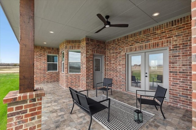 view of patio / terrace with ceiling fan and french doors