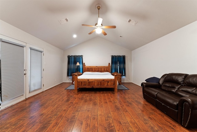 bedroom featuring lofted ceiling, a ceiling fan, visible vents, and dark wood-type flooring