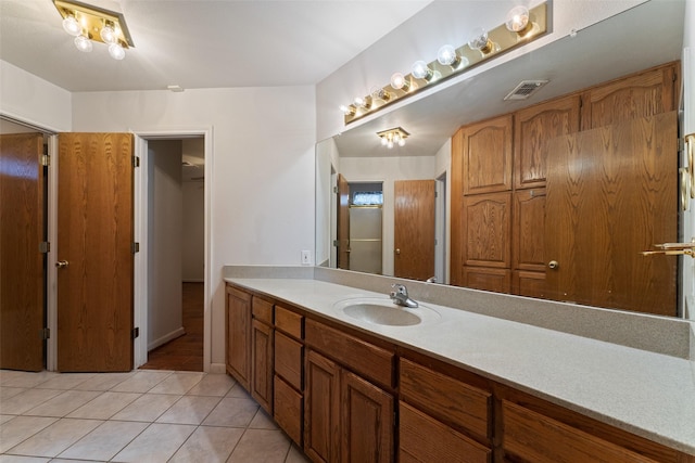 bathroom featuring vanity, tile patterned flooring, and visible vents