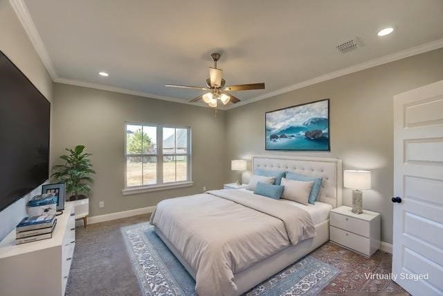 carpeted bedroom featuring ceiling fan and ornamental molding