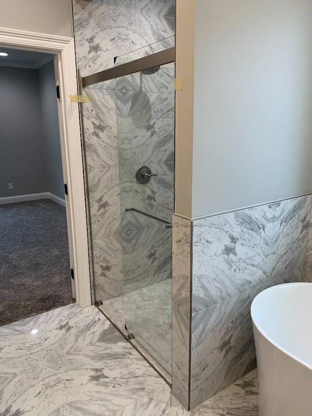 bathroom featuring independent shower and bath and tile walls