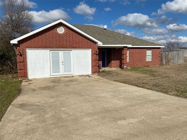 single story home with a garage