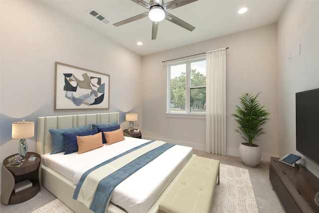 bedroom with ceiling fan and light carpet