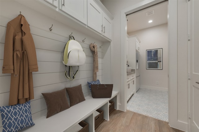 mudroom featuring light wood-type flooring