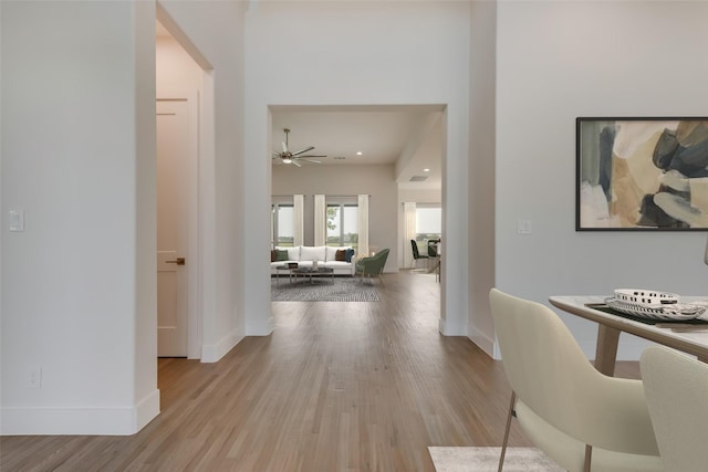 hallway with light wood-type flooring