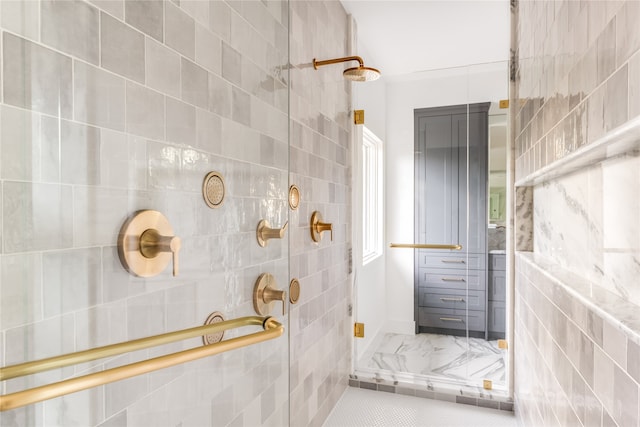 bathroom with tile walls and tile patterned floors