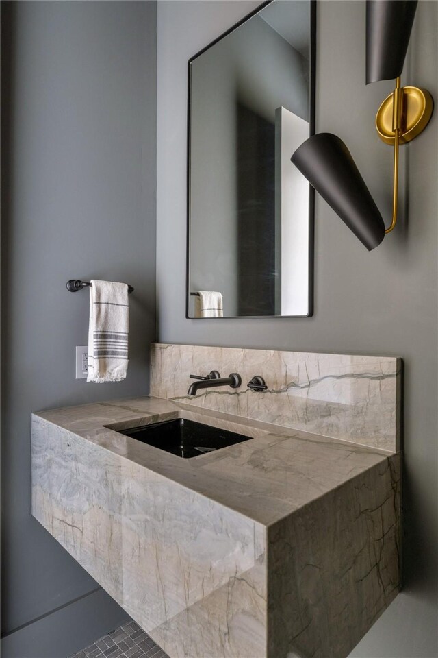 bathroom with tile patterned flooring and sink