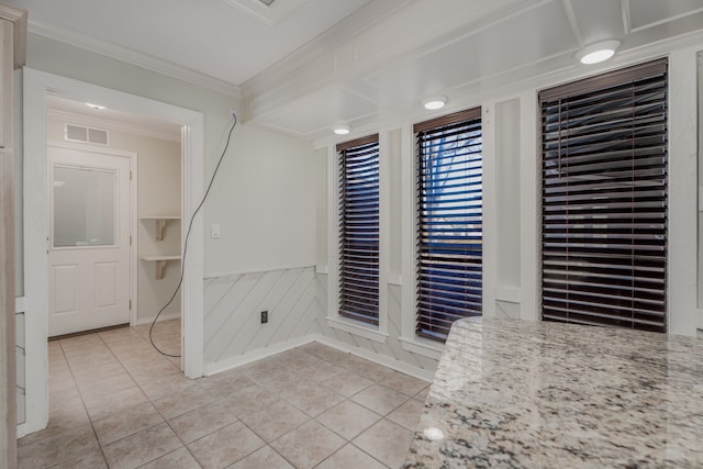 interior space featuring crown molding