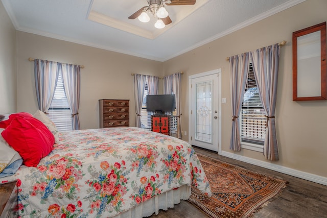 bedroom featuring ornamental molding, wood-type flooring, ceiling fan, and access to exterior