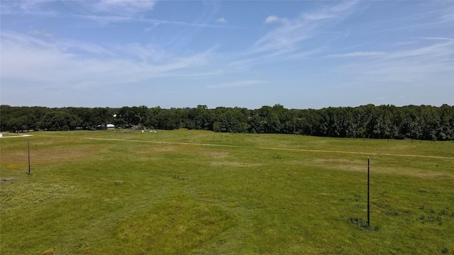 exterior space with a rural view