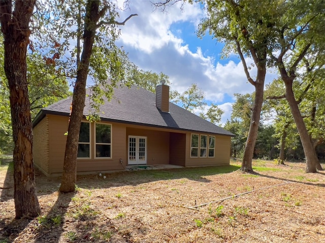 view of side of property featuring a yard and central air condition unit