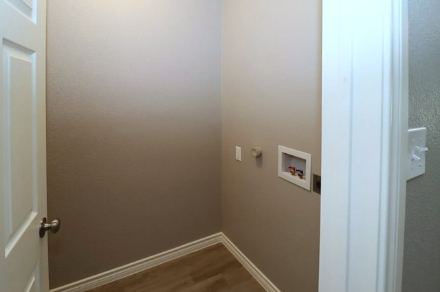 laundry area with washer hookup and wood-type flooring