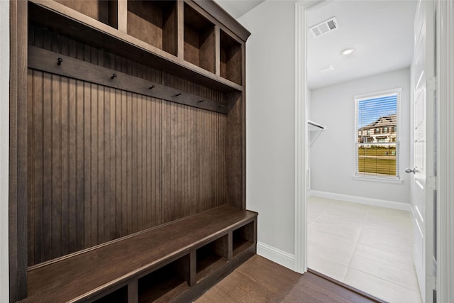 mudroom with tile patterned floors